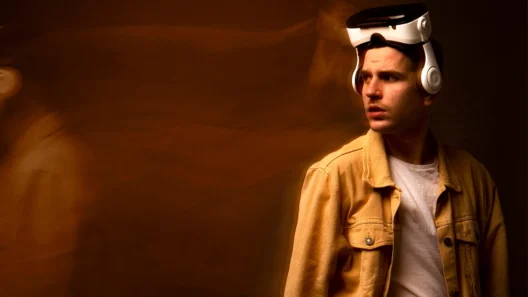 A man wearing a futuristic VR headset looking thoughtful, symbolizing the uncertainty and human reflection surrounding the AI bubble and technology trends in 2025.